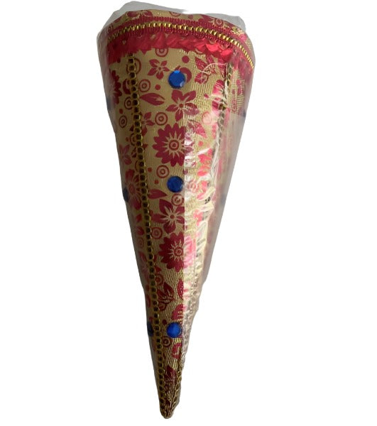 Decorated empty cone to be filled with sweets or sugar and exchanged by the bride and the groom during the engagement ceremony.