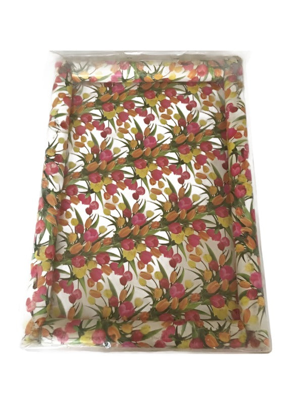 Decorated tray with floral print used for various wedding rituals.