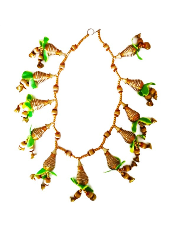 A decorated string tied at the main entrance as a sign of auspicious function.